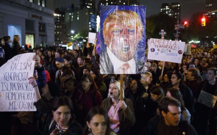 ‘Not  my president’: Thousands of anti-Trump protesters march in New York, Chicago and beyond, with more rallies planned