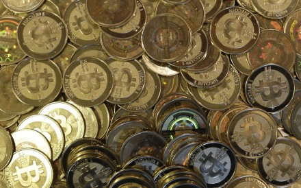 Bitcoin tokens. Its price here reaching 14,180 yuan (US$2,058) per coin on Monday, almost twice its January low value of around 4,092 yuan. Photo: AP
