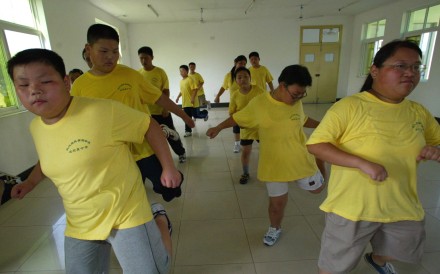 Children go through their paces at a summer camp for overweight youngsters in Wuhan. Photo: AP