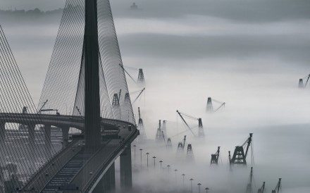 Stonecutters Bridge surrounded by fog. Photo: Edward Tin