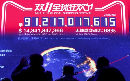 A screen showing the total value of goods transacted during Alibaba’s 11.11 global online shopping festival in Beijing, on November 12, 2015. Photo: Reuters