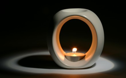 A burner filled with aromatherapy oils can help you relax.