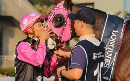 Derek Leung kisses Beauty Generation after winning the Hong Kong Mile. Photos: Kenneth Chan