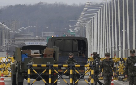 South Korean army soldiers walk on Unification Bridge, which leads to the demilitarised zone between North and South Korea on Thursday. South Koreans can only stand and watch as Donald Trump and Kim Jong-un threaten one-another. Photo: AP