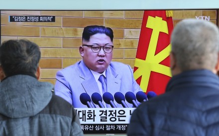 People watch a TV screen showing North Korean leader Kim Jong Un's New Year's speech in Seoul, South Korea. Photo: AP