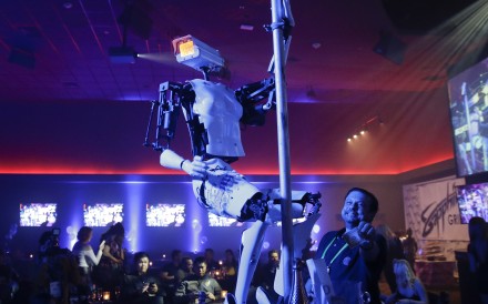 A pole-dancing robot built by British artist Giles Walker. Photo: AP