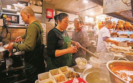Chiu Chow Delicacies staff (from left) Li Wei Huang, Peng Bing, Lam Shek-hing and Ma Zhen Ting work in the restaurant’s kitchen in North Point. Photo: Xiaomei Chen