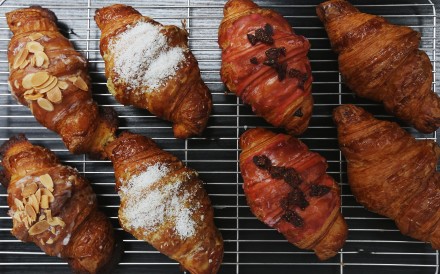 Croissants are the most popular pastry product at Plumcot in Tai Hung. This picture shows (from left) almond croissants, mango and coconut croissants, strawberry croissants, and regular croissants. Photo: Xiaomei Chen