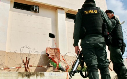 A group of 25 Uygurs used blankets to climb out of their cells in southern Thailand in a daring predawn escape in November. Photo: Reuters