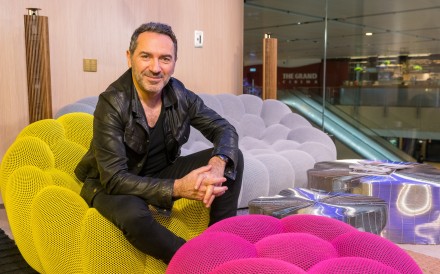 French designer Sasha Lakic sitting on his famous Bubble sofa in the io.t by HKT Concept Store at Elements mall. French designer Sasha Lakic sitting on his famous Bubble sofa in the io.t by HKT Concept Store at Elements mall.