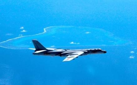 A Chinese H-6K bomber patrols the islands and reefs in the South China. Photo: AP