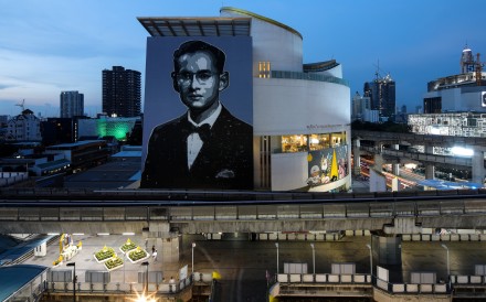 A portrait of the late King Bhumibol Adulyadej adorns the Bangkok Art and Culture Centre. Picture: Reuters