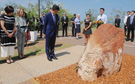 Japanese Prime Minister Shinzo Abe visiting a memorial to the Imperial Japanese Navy’s I-124 submarine, which sank in 1942 off the Northern Territory city of Darwin, Australia on November 17, 2018. Photo: Reuters