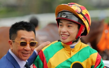 Trainer Me Tsui congratulates Jack Wong after they combined to win with Dragon Dance. Photos: Kenneth Chan