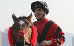 Tim Clark cherishes his moment winning the day's feature event with the Andreas Schutz-trained Eagle Spirit. Photo: Kenneth Chan.