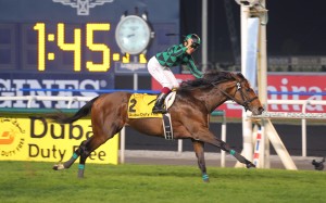 Yuichi Fukunaga salutes as Just A Way wins the Dubai Duty Free comfortably. He will be named the world's best racehorse of 2014 in London next week - but would he win the award if a different format was used? Photo: Kenneth Chan