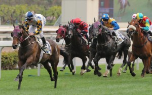 Zac Purton eases up on Victory Magic as he crosses the line with a leg in the air to win in Class Two last time out. He is the likely favourite in the Queen Mother Memorial Cup today.Photos: Kenneth Chan