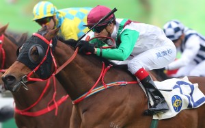 Joao Moreira gets the best out of Be There Ahead to win again for Peter Ho. Photo: Kenneth Chan