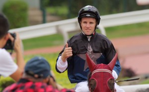 Tommy Berry returns to scale after winning aboard Bad Boy for trainer John Moore. Photos: Kenneth Chan