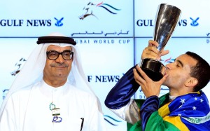 Joao Moreira (right), pictured draped in a Brazilian flag after winning the 2014 Golden Shaheen on Sterling City, could be Brazil’s next president with skills he has displayed in the politically tough Hong Kong racing environment. Photo: EPA