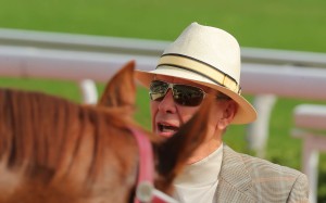 John Moore looks over Dragon Harmony after his win at Sha Tin on Sunday. Photos: Kenneth Chan