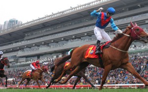Joao Moreira celebrates as Rapper Dragon captures the Classic Cup. Photos: Kenneth Chan