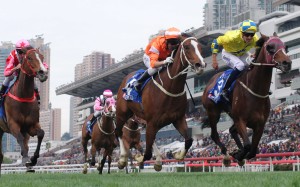 Hugh Bowman (right) lifts Werther to victory in the Group One Citi Hong Kong Gold Cup. Photos: Kenneth Chan