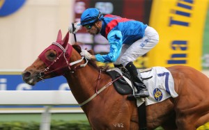 Joao Moreira punches the air after winning the Group Two Chairman’s Trophy with Rapper Dragon. Photos: Kenneth Chan