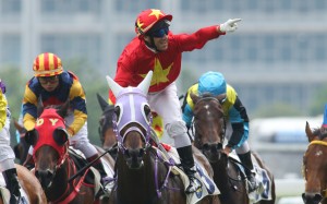 Brett Prebble salutes as King Winsa prevails at Sha Tin on Saturday. Photos: Kenneth Chan