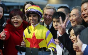Joao Moreira and John Size smile for photos with the connections of Ping Hai Star. Photos: Kenneth Chan