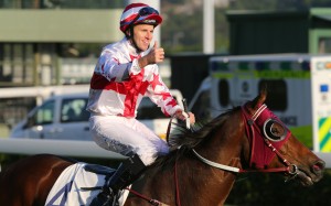 Tommy Berry gives the thumbs up after winning aboard Agree at Sha Tin on Saturday. Photos: Kenneth Chan