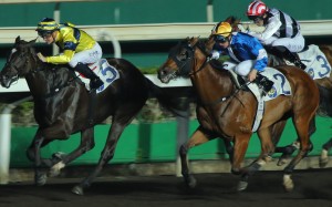 Chad Schofield drives Shimmer And Shine (left) to victory at Sha Tin on Wednesday night. Photos: Kenneth Chan