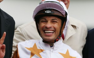 Silvestre de Sousa shares a laugh with the connections of Wishful Thinker after winning at Sha Tin on Sunday. Photos: Kenneth Chan