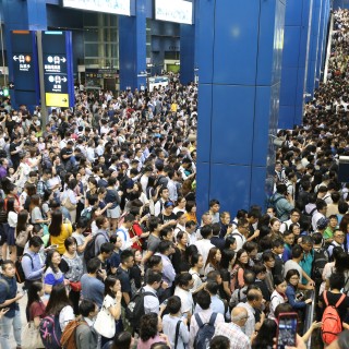 After one of the most powerful storms on record to hit the city, suspensions and delays mean confusion and long waits for residents