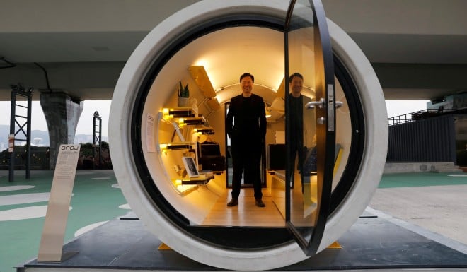 Architect James Law inside the OPod, his water pipe turned micro-flat.