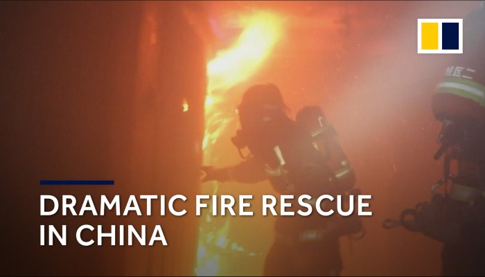 Firefighters save 10 people trapped in burning high-rise | South China ...