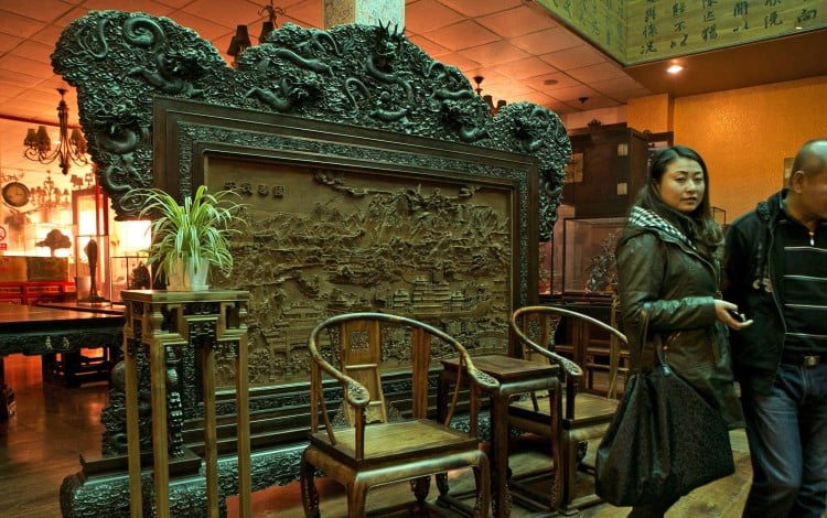 Furniture made from Vietnamese rosewood on sale at a shop in Beijing. The richly hued hardwood is being illegally cut from Southeast Asian forests, then smuggled and turned into Chinese furniture. Photo: AP
