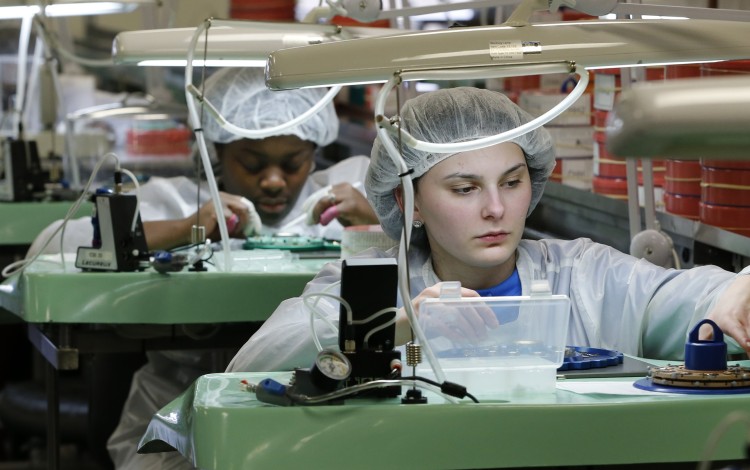 Both sides have benefited from trade ties, white paper says in response to accusations that China is trying to undermine rival's manufacturing base