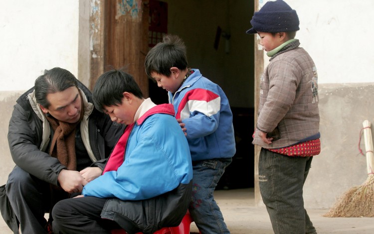 Charity became a full-time career after a visit to an HIV-ravaged province in central China, where the eyes of a dying child changed everything