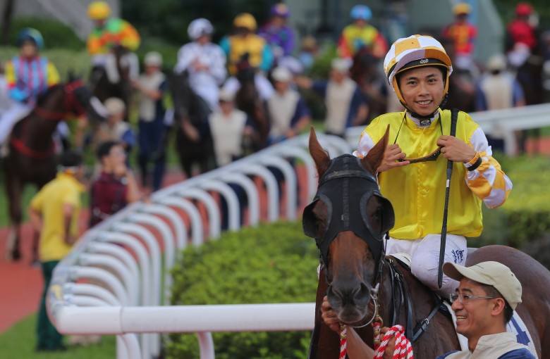Matthew Poon is all smiles after winning aboard Penang Hall. Photos: Kenneth Chan