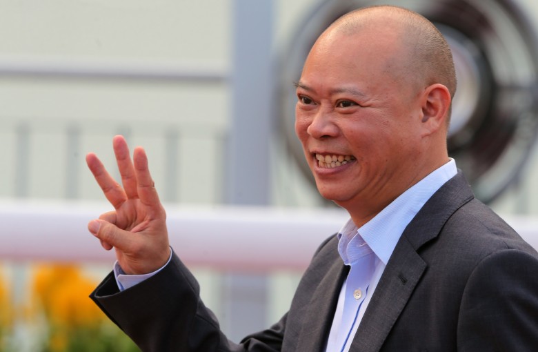 Trainer Chris So celebrates his treble. Photo: Kenneth Chan