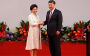 A resplendent Carrie Lam shakes hands with President Xi Jinping after being sworn in as chief executive. Photo: Reuters