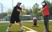 Robert Robertson coaching softballers at Beijing Huijia Private School, where he also coached girls in volleyball and soccer, and taught phys ed and communications. There is no suggestion Robertson had improper relationships with any students at Huijia. Photo: Beijing Huijia Private School
