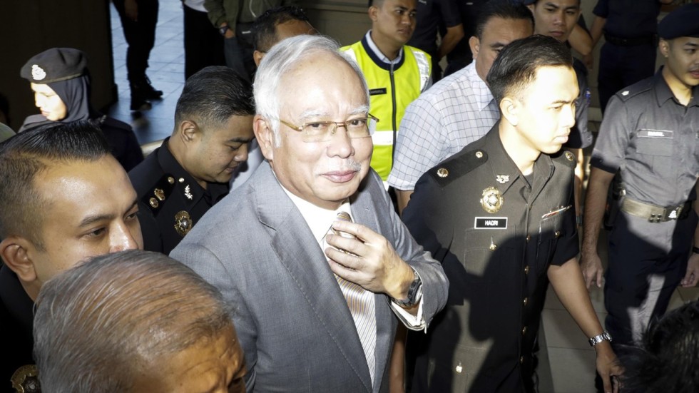 Former Malaysian PM Najib Razak and former treasury chief ...