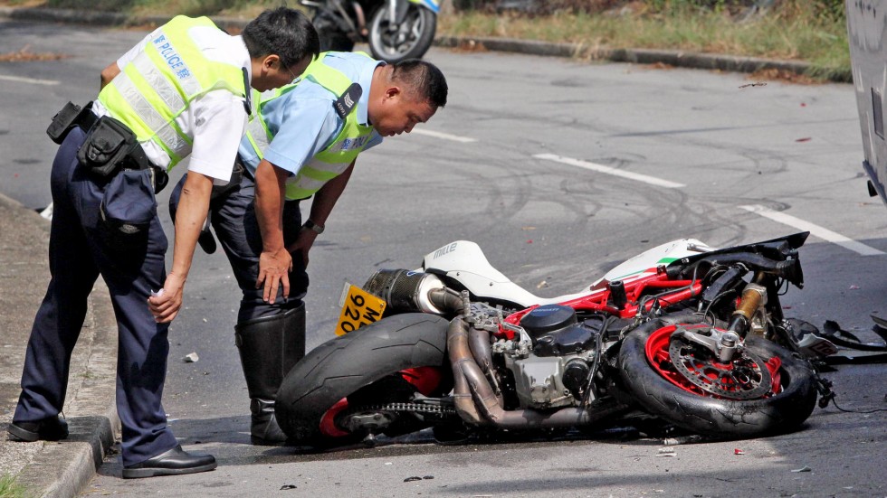 Motorcyclist killed in collision with tour bus in Tai Po ...