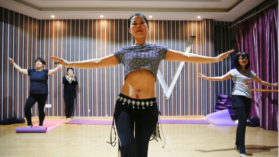 In pictures: Chinese tattooist offers help to cover mums ...