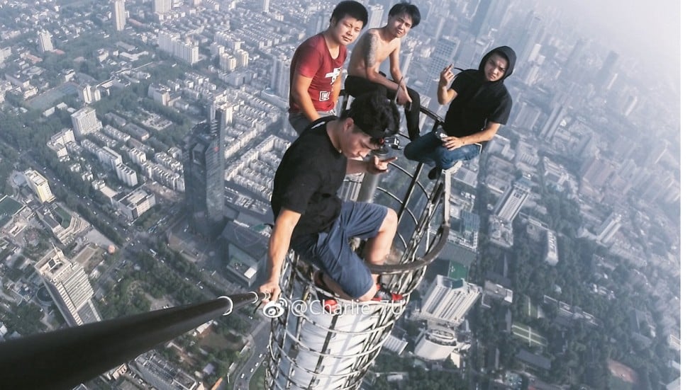 Chinese daredevils risk 450m fall for the sake of a rooftopping selfie South China Morning Post