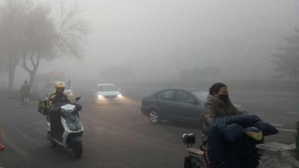 2 of congress parts Smog road causes blankets northern China, Beijing,