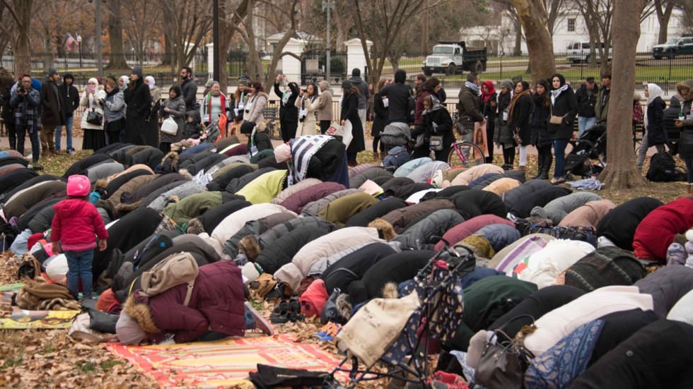 Muslim protesters hold Friday prayers in front of the White House, two days after President Donald Trump declared Jerusalem as the capital of Israel, in Washington on December 8. Photo: AFP