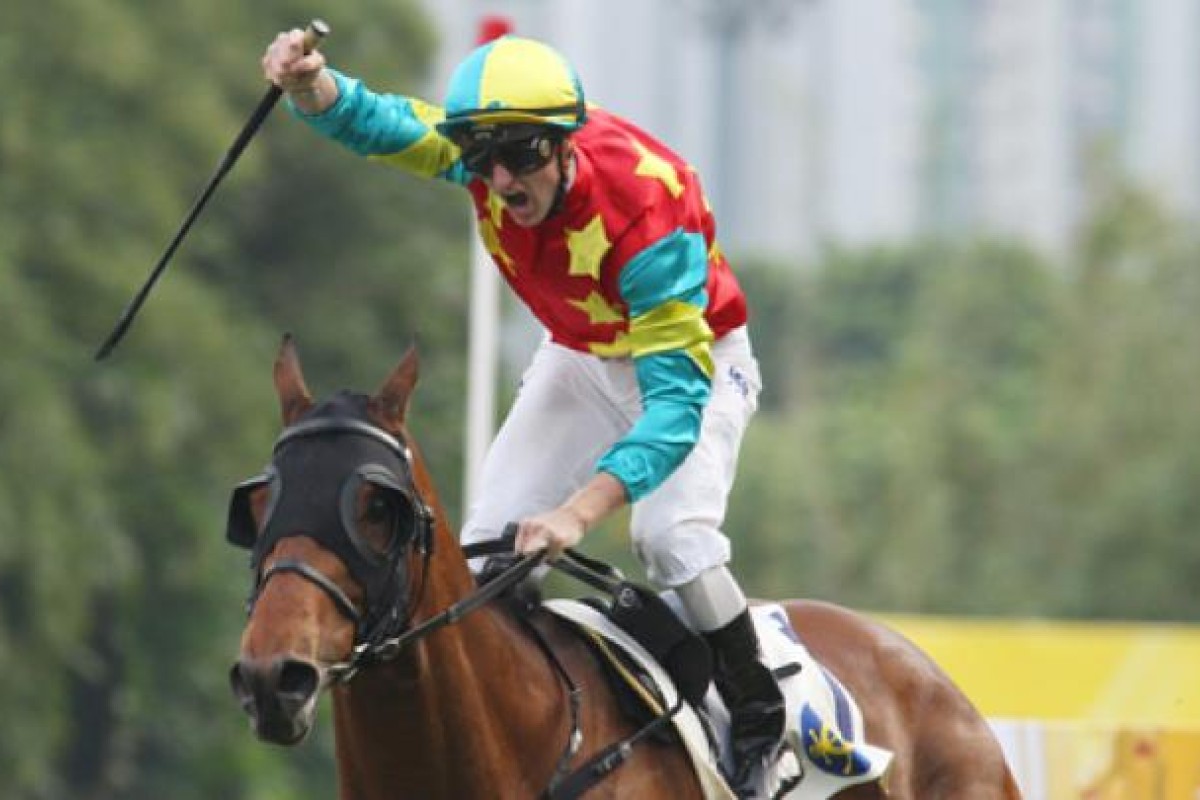 Zac Purton brings Ambitious Dragon home for the win at Sha Tin on Sunday.  Photo: Kenneth Chan